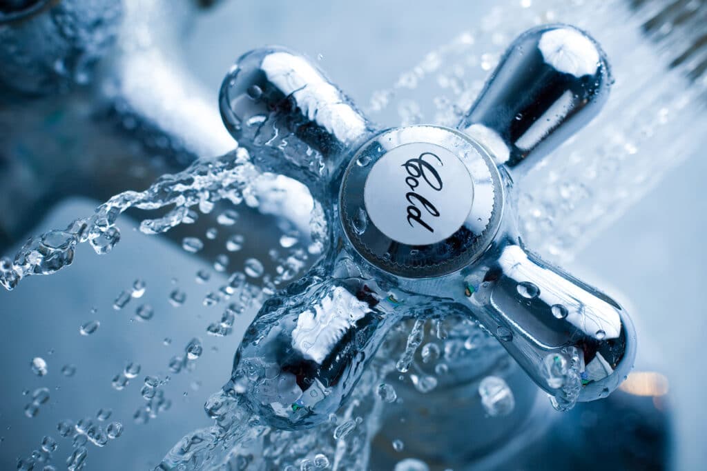 water facet set to turn on cold shower setting